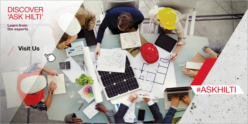 People working around a table on a construction site